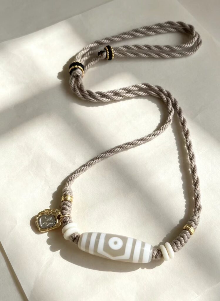Prosperity Three-Eyed Dzi Necklace 1588ef78430fb1c6f913cb1d4ab44100