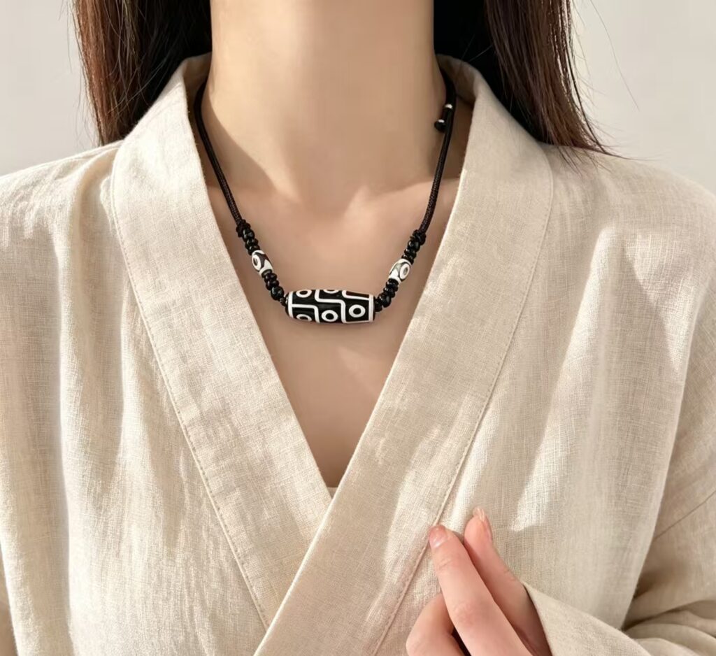 Nine-Eye Guardian Dzi Necklace 569c7187bc541a107126a98b19411b98
